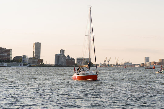 Sailboat on the IJ River with Amsterdam Skyline, Netherlands