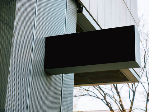 Mock up Shop logo sign Black metal Signage Store front 