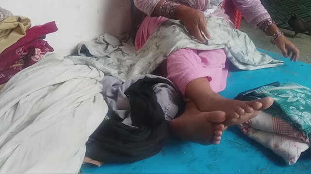  Woman Doing Handwork and Sewing Clothes at Home