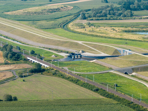 Aerial view showing flood protection infrastructure with odra river and railway