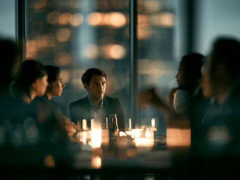 Diverse Business men and women at their meeting at modern urban glassy office