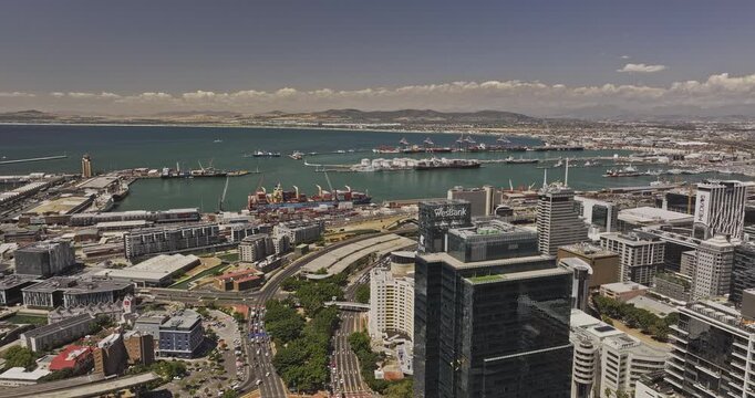 Cape Town South Africa Aerial v70 tracking flyover above De Waterkant and Downtown toward Foreshore, shipyard terminals, VA Waterfront and Table Bay - Shot with Mavic 3 Pro Cine - Jan 11th 2024