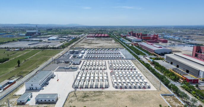 Aerial View of Large Battery Energy Storage Station in Industrial Factory Zone