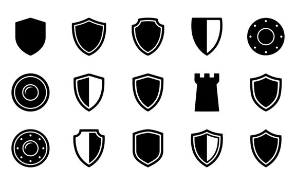 A collection of various black shield icons and security symbols isolated on a white background for web design projects