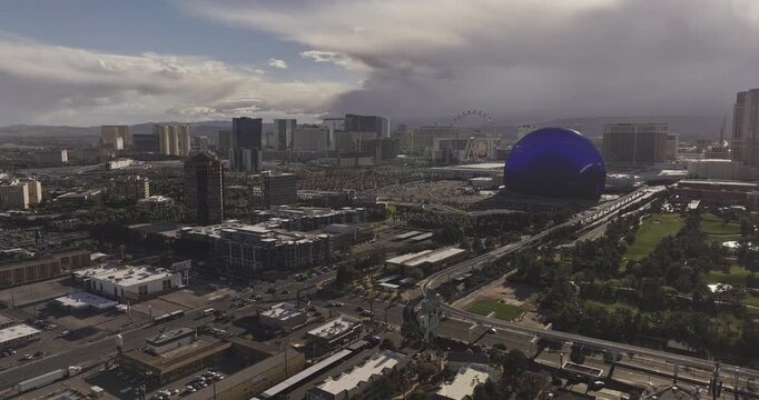 Las Vegas Nevada Aerial v60 low flyover above university neighborhoods, revealing Sphere, Strip hotels and Harry Reid International Airport - Shot with Mavic 3 Pro Cine - Apr 29th 2024