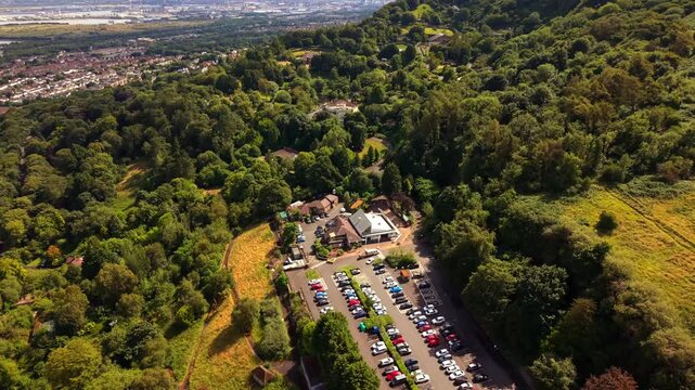 Passing 4K 60FPS aerial video of Belfast Zoo and Cavehill in North Belfast, Northern Ireland in the UK on a bright sunny day. Produced with Rec709 colour.