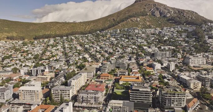 Cape Town South Africa Aerial v15 flyover above Sea Point and Fresnaye residences toward Signal Hill, Lion's Head and Bantry Bay - Shot with Mavic 3 Pro Cine - Jan 10th 2024