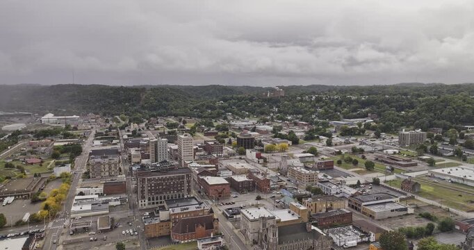 Steubenville Ohio Aerial v2 flyover above the town center toward the Ohio River bridges and surrounding wooded hillsides - Shot with Mavic 3 Pro Cine - Sept 22nd 2023
