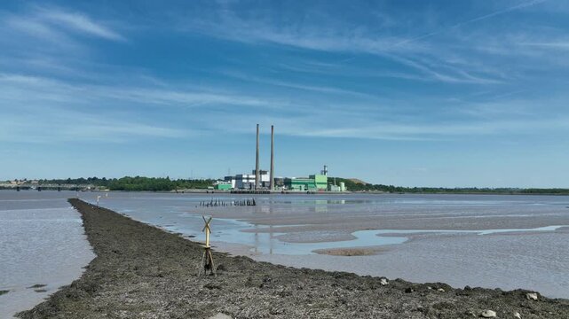 High-quality aerial video of hydroelectric electricity facility beside the River Suir. Wexford's scenic landscape complements sustainable energy production in this professional drone recording.