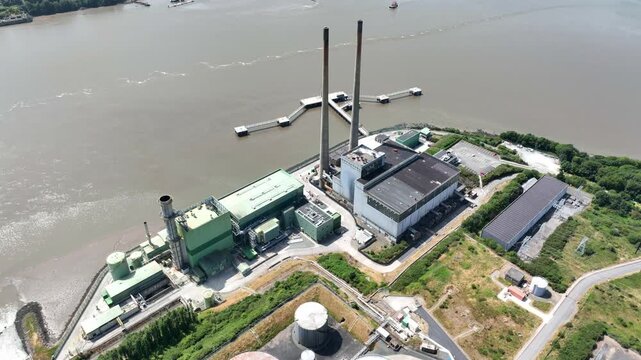 static aerial view of electricity generation plant on the River Suir, Wexford, Ireland.