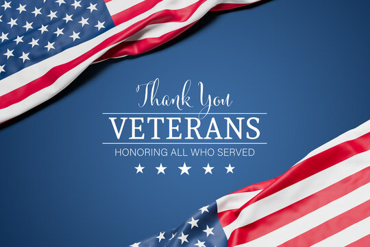 Two wrinkled flags of the USA draped onto a flat dark blue surface and the text "Thank You - Veterans - Honoring all who served"