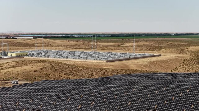 Aerial View of Utility-Scale Battery Energy Storage System and Substation in Arid Northwest China Desert