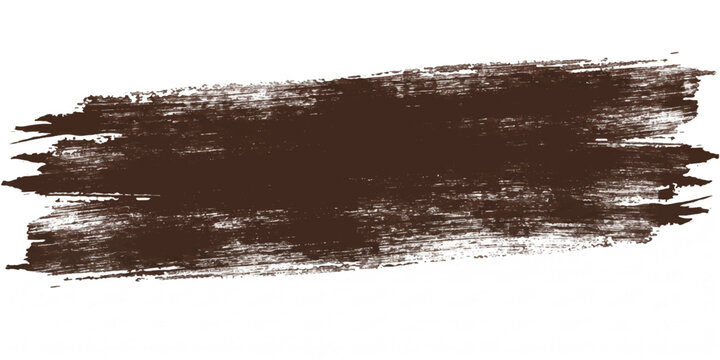 A dark brown, textured brush stroke, resembling a paint splash or stain, stretches across a plain background, conveying a sense of raw, artistic expression or perhaps a natural element.