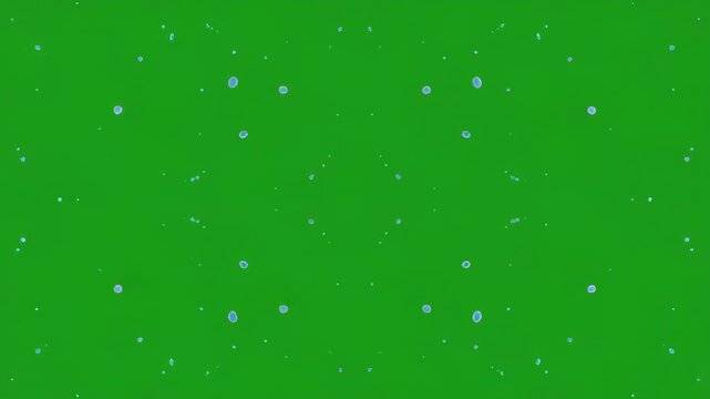 Blue liquid splashes and forms intricate radial patterns against a vibrant green background