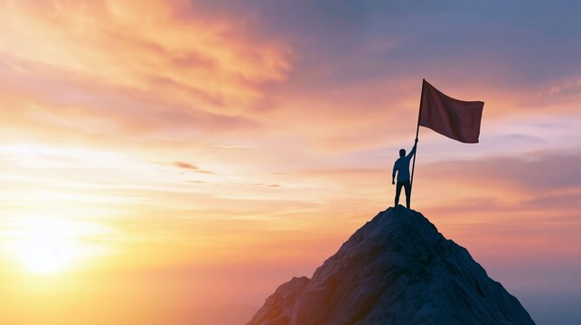 Silhouette of a person standing atop a mountain, proudly holding a flag with arm raised against a dramatic sunset sky