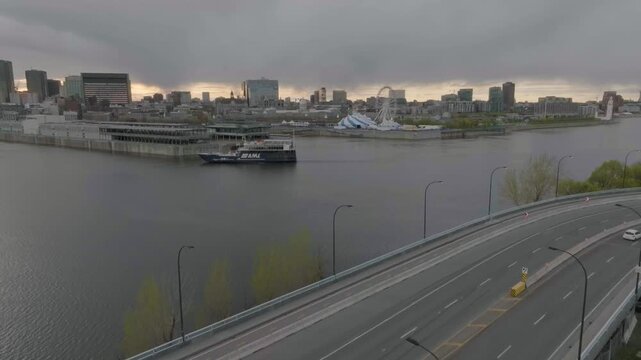 drone overlooking the old port of montreal circle du soleil n boat in the city of montreal quebec canada