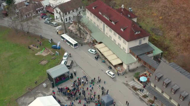 drone flying over the small town of skalnimlya near blansko in czech republic where some people n a concer tare happening