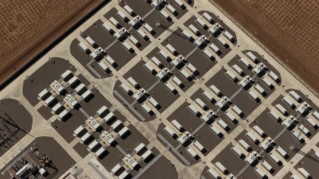 Aerial View of Utility-Scale Solar Farm with Battery Energy Storage System in Arid Desert