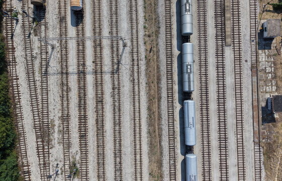 Aerial view of the Severna Zona industrial railway yard with freight train tank cars on tracks in Pancevo, Serbia.