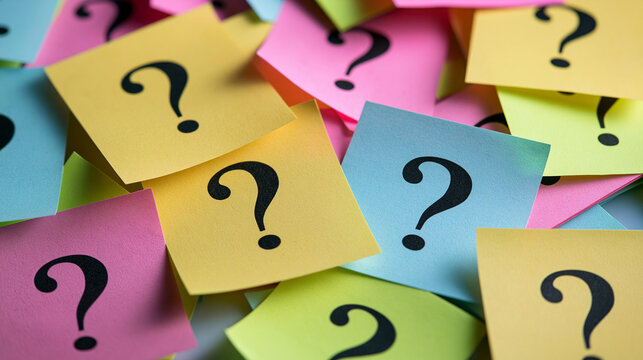Colorful sticky notes with question marks scattered. Use this image for business problem solving or FAQ concepts.