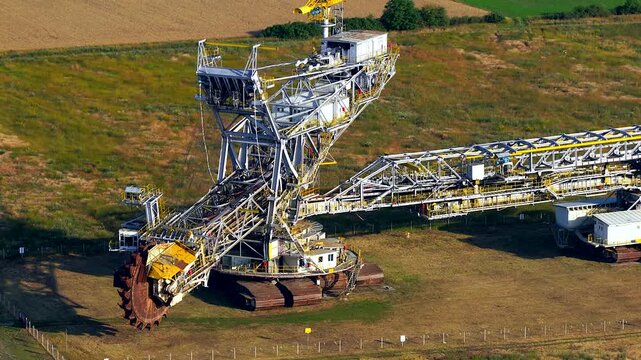 Aerial view of a massive bucket wheel excavator used for surface mining. Heavy machinery for coal extraction and energy production in poland