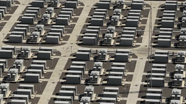 Aerial View of Utility-Scale Solar Farm with Battery Energy Storage System in Arid Desert