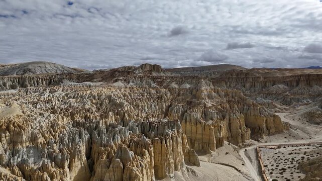 Drone view of multicolored earth forest landscape in Xiayigou, Tibet, China