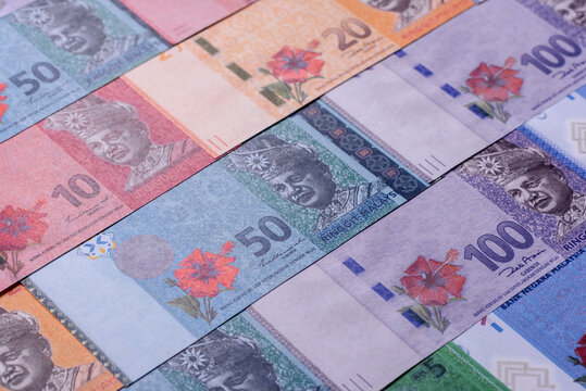 Malaysian ringgit banknotes as a tool for trade and financial transactions. The Malaysian ringgit