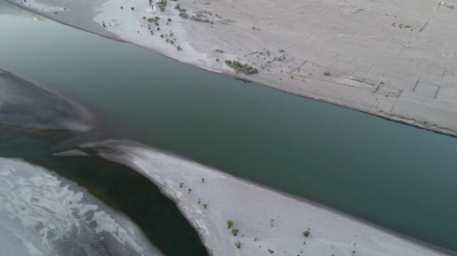 Indus River flows between the Karakoram and Himalayas at Skardu, Pakistan
