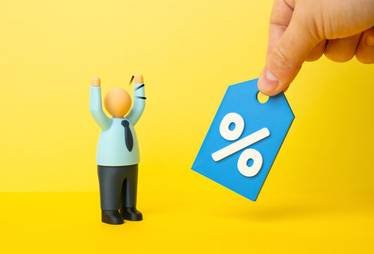 An office worker is happy to receive a discount. Discount coupons and promotions. Employer bonuses, discounted prices, and employee privileges.