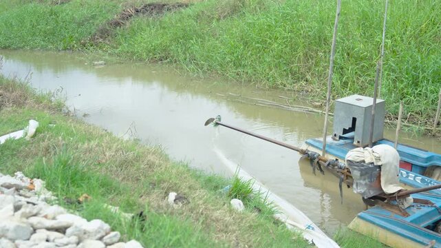 Boat with propeller in canal