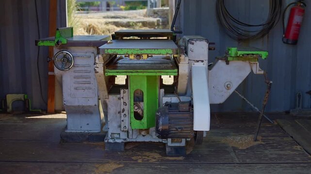 Industrial wood planer working at a carpentry shop in Portugal