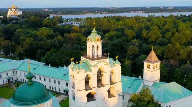 Yaroslavl, Russia. Belfry of the Yaroslavl Spaso-Preobrazhensky Monastery (Spaso-Yaroslavl Monastery) - an ancient men's monastery in Yaroslavl. Sunset time. Drone footage