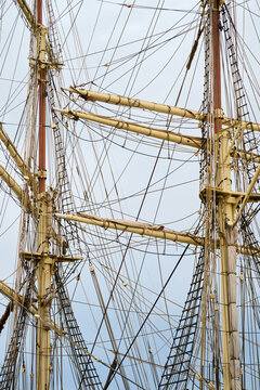 Close-up of the masts of a retro sailing ship.