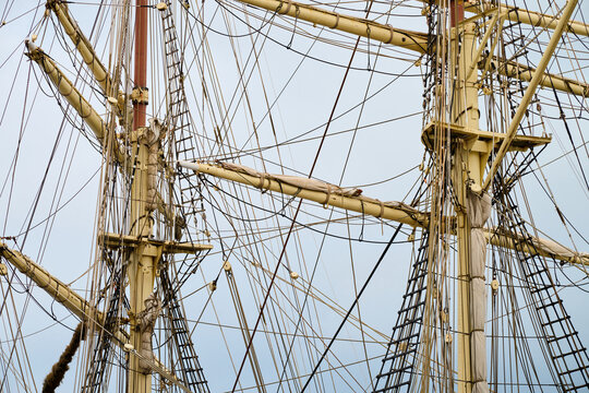 Close-up of the masts of a retro sailing ship.