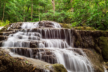 Beautiful waterfall in Erawan waterfall National Park in Kanchanaburi, Thailand. © ckDome