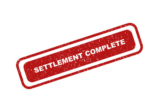 Red grunge rubber stamp with the text settlement complete on document
