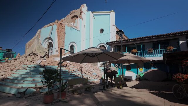 colombia earthquake damage at town square with collapsed church