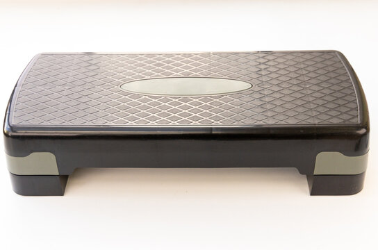 Black and grey aerobic step platform for fitness exercise and workout equipment