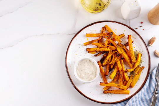 Tasty Air Fried Carrot or Pumpkin Fries. Homemade french fries made with Carrot or Pumpkin wedges, healthy vegan diet food idea