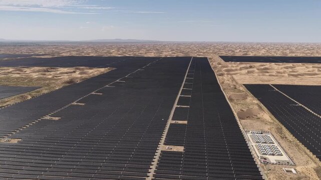 Aerial View of Utility-Scale Solar Farm with Battery Energy Storage System in Arid Desert