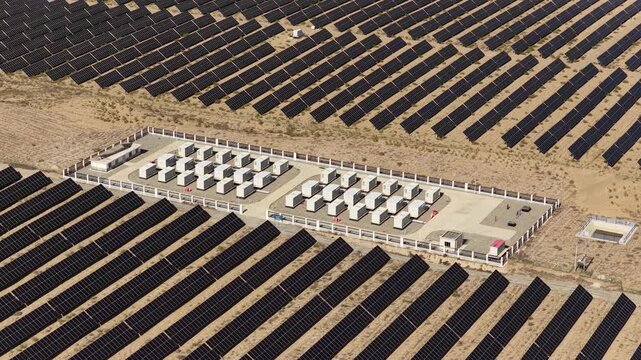 Aerial View of Utility-Scale Solar Farm with Battery Energy Storage System in Arid Desert