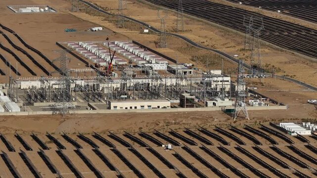 Aerial View of Utility-Scale Solar Farm with Battery Energy Storage System in Arid Desert