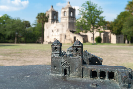 Mission Concepcion (Mision Nuestra Senora de la Purisima Concepcion de Acuna) with a metal model replica in the foreground, San Antonio, Texas, USA