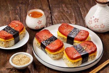 Classic Hawaiian spam musubi, made with grilled spam, seasoned rice, and wrapped with nori seaweed © Noor