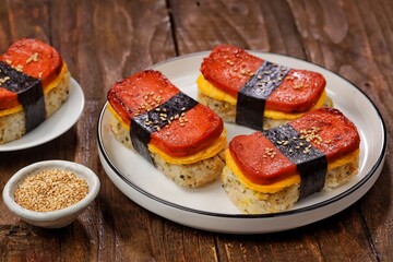 Classic Hawaiian spam musubi, made with grilled spam, seasoned rice, and wrapped with nori seaweed © Noor