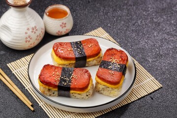 Classic Hawaiian spam musubi, made with grilled spam, seasoned rice, and wrapped with nori seaweed © Noor