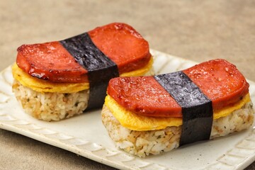 Classic Hawaiian spam musubi, made with grilled spam, seasoned rice, and wrapped with nori seaweed © Noor