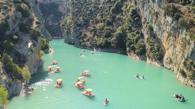 Gorges du Verdon Stunning Boating Experience. Explore turquoise waters and scenic cliffs. Ideal for nature lovers and adventure seekers. A glimpse of serene beauty awaits.