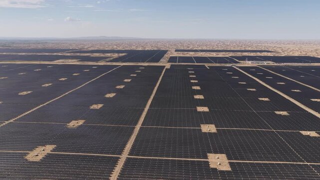 Aerial View of Utility-Scale Solar Farm with Battery Energy Storage System in Arid Desert